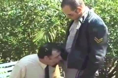 Uniformed Smoking homosexual Cop And Bear