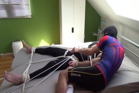 Two boyz Having enjoyment In Lycra With Breathcontrol And Magic Wand
