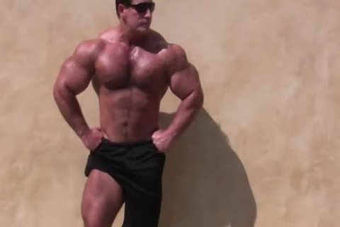 George Shows Off His Muscles