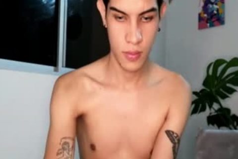 Skinny Latino twink With Tattoos And Earings Teases On webcam